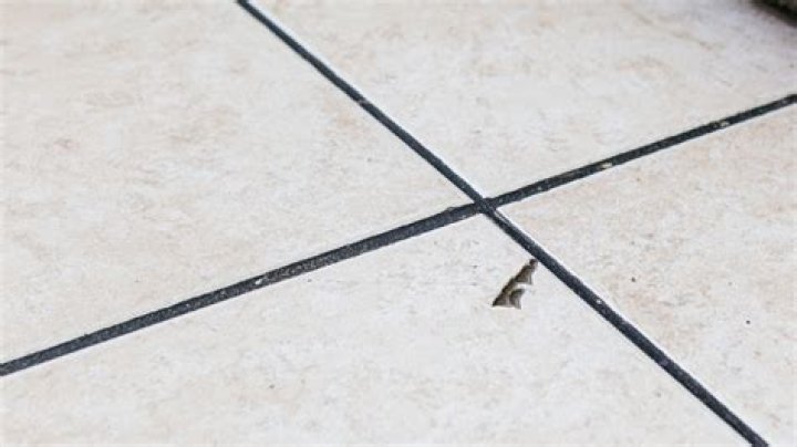 How do I keep my floor tiles from lifting up and cracking?
